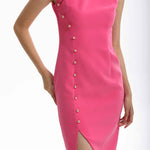 A professional woman wearing a vibrant hot pink modern qipao dress, featuring a classic mandarin collar, sleeveless design, and elegant gold button side-fastening with a sophisticated slit for an oriental chic look.