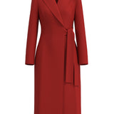 A sophisticated woman walking in London wearing an elegant vibrant red wrap coat dress, featuring a tie-waist belt and notched lapels for a polished executive street style look.