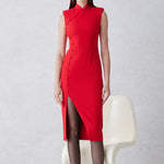 A professional woman wearing a sophisticated black modern qipao, featuring a classic mandarin collar, sleeveless slim-fit silhouette, and elegant side buttons with a high-low slit for a timeless oriental chic look.